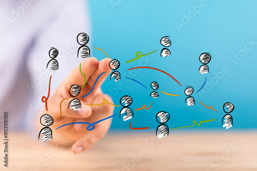 Hand pointing at a network ...