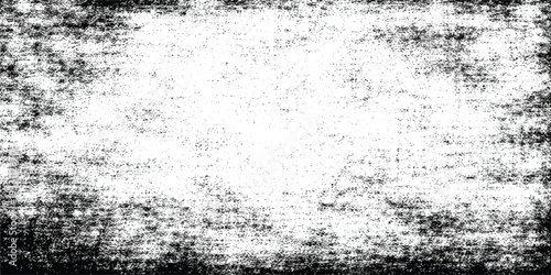 Abstract grunge black background with a rough wall texture featuring blue paint splashes and old liquid drops on a cold gray surface