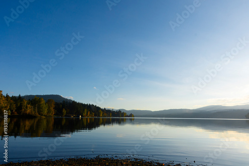 An image of calm waters of Shawnigan Lake, BC, Canada