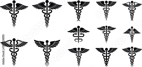 Black and white caduceus symbols with wings and snakes on a white background medical