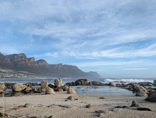 Scenic View of Camps Bay Beach and the Twelve Apostles Mountain Range in Cape Town