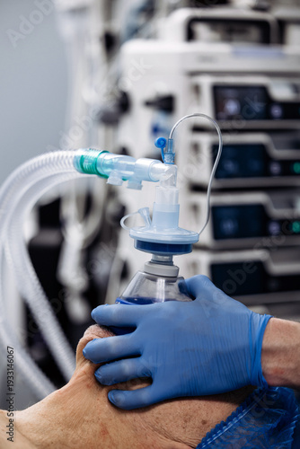 Vászonkép Anesthesiologist holding anesthesia face mask ready to induce general anesthesia in hospital surgery room