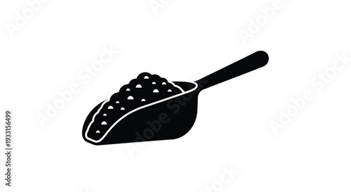 Black spoon filled with granular material simple graphic silhouette