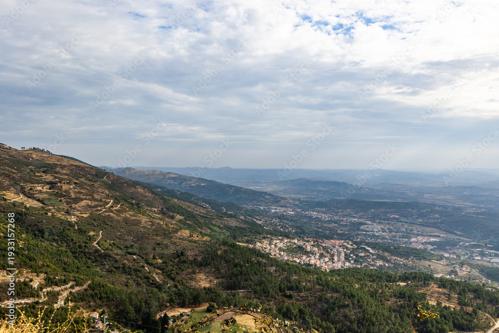 Fototapeta premium Close urban panorama of Covilha with hillside neighborhoods and surrounding landscape, Portugal, Covilha, 16 October 2025
