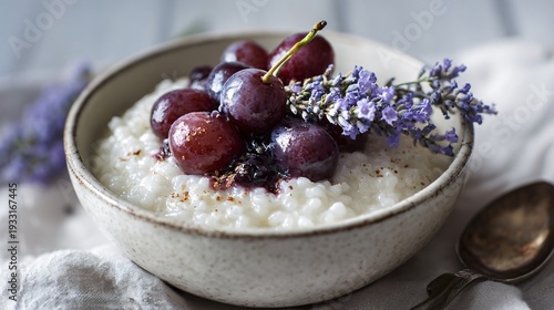 Creamy rice pudding infused with Prosecco and topped with fresh grape compote, subtle lavender hue, served in ceramic bowl, soft cozy kitchen lighting