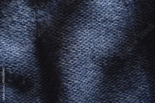 Abstract structure- wrinkles on the fabric. Textile-  simple dark background