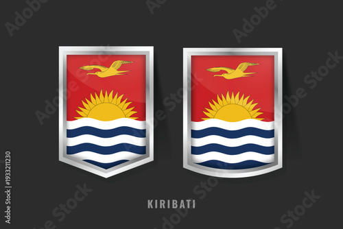 3D glossy shield badges of Kiribati flag. Red field with golden sun rising over Pacific waves and three golden frigatebirds flying, national emblem design on dark background