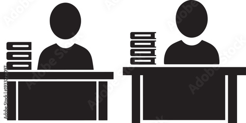 Silhouette person at desk with books studying working