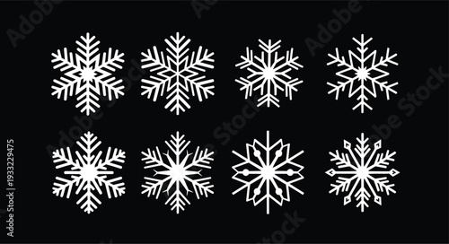 Collection of unique white snowflakes on a black background