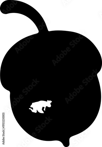 A small animal peeks out from inside a large, black acorn.