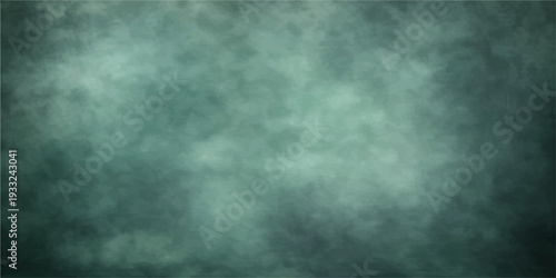 A dark blue grunge background texture with a moody mist of smoke and storm clouds drifting across a black night sky under the dim light of a hidden moon