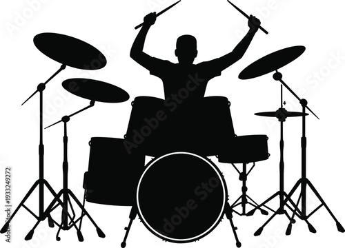 Black silhouette of a male drummer playing a full drum kit with sticks raised for live rock concert musical performance and entertainment concepts.