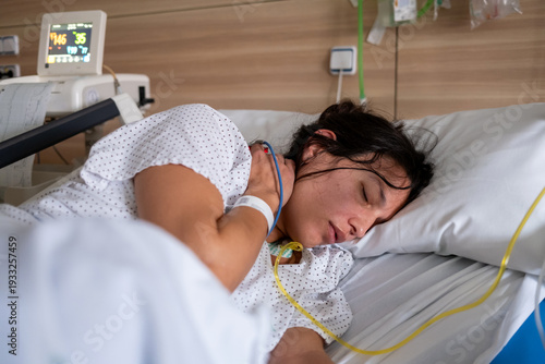 Exhausted Pregnant Woman Lying In Hospital Bed