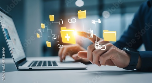 Businessman managing digital files and cloud storage folders on virtual screen with laptop computer