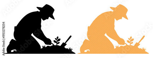 Gardener in hat carefully planting small seedling with shovel