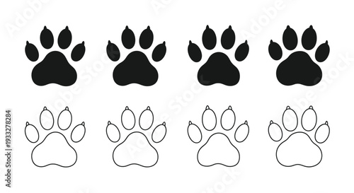 Four sets of animal paw prints black filled and white outline
