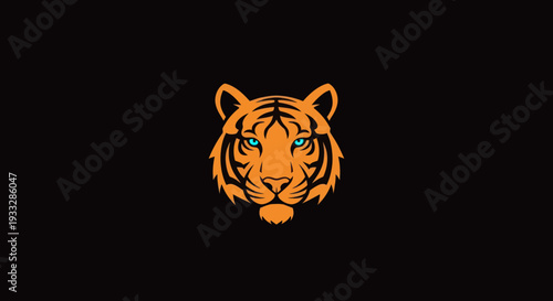 Orange tiger head, blue eyes, isolated on a black background