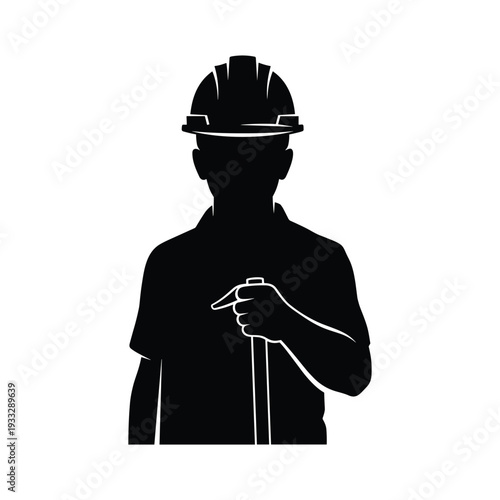 Construction worker pointing confidently in hard hat