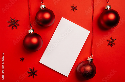 Wallpaper Mural Beautiful red Christmas balls hang against a vibrant red background, creating a warm and inviting atmosphere perfect for holiday festivities. A blank card awaits a heartfelt message Generative AI Torontodigital.ca