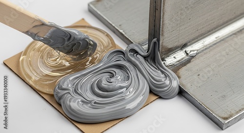 Gray epoxy resin being mixed and applied