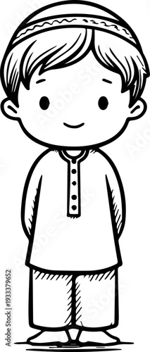 Smiling boy wearing traditional Muslim cap and kurta