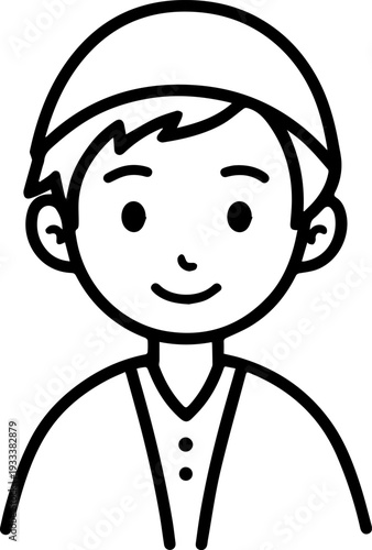 Smiling boy wearing traditional Muslim cap and kurta