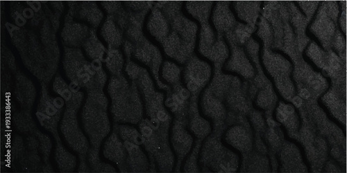 A dark black leather texture background features a rough macro pattern on a natural material surface, creating a vintage grunge backdrop for fashion design