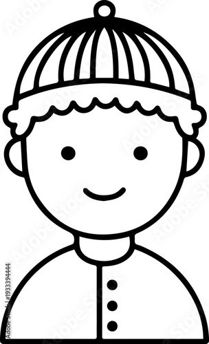 Smiling boy wearing traditional Muslim cap and kurta