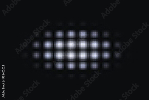 Tiny white and light blue dots form a soft glowing oval shape on a deep dark surface