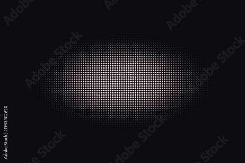 Tiny white and light pink dots form a soft glowing oval shape on a deep dark surface