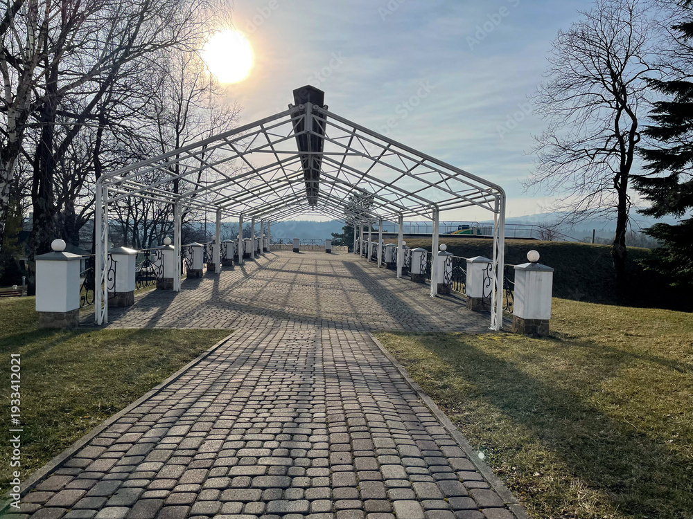 Obraz premium railing and pavement in recreation areas and near architectural buildings