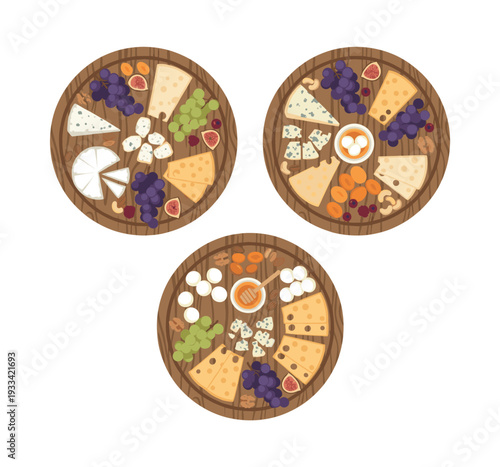Three charcuterie boards featuring a selection of cheeses, fresh grapes, dried fruits, almonds, walnuts, and honey