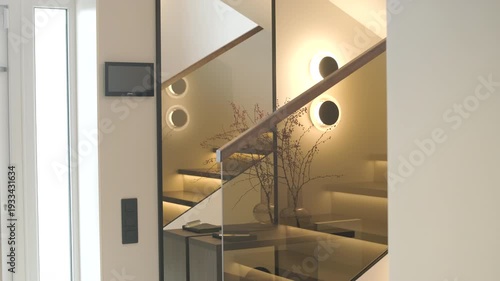 Modern interior design of a wooden staircase with integrated warm LED strip