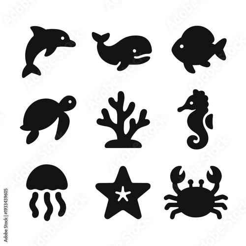 Silhouette icons of marine life: dolphin, whale, fish, turtle, and more