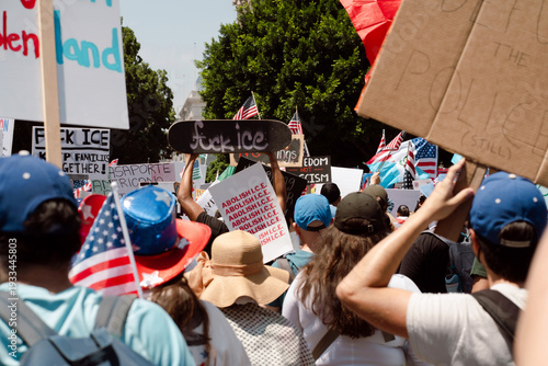 Protesters March Holding Anti Ice Signs 