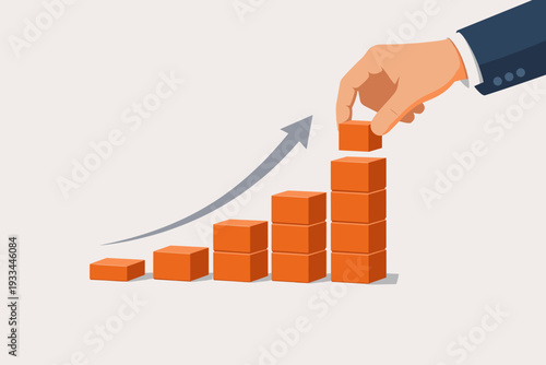 Businessman hand stacking orange blocks as a step stair for growth with an upward arrow. Concept of business support, financial success, investment, career development, and strategic planning.