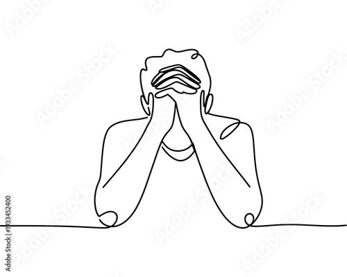 A person experiencing stress and anxiety with their hands on their face