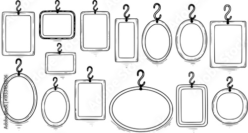Collection of empty frames in different shapes hanging hooks square
