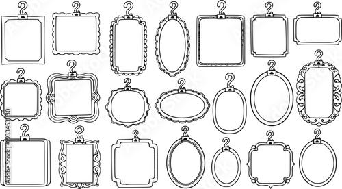Collection of empty frames in different shapes hanging hooks square
