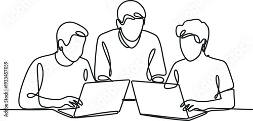 Three people working together on laptops in a collaborative workspace