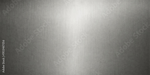 Metallic Texture: A close-up shot of a smooth, brushed metal surface, reflecting light to create subtle gradients and textures.