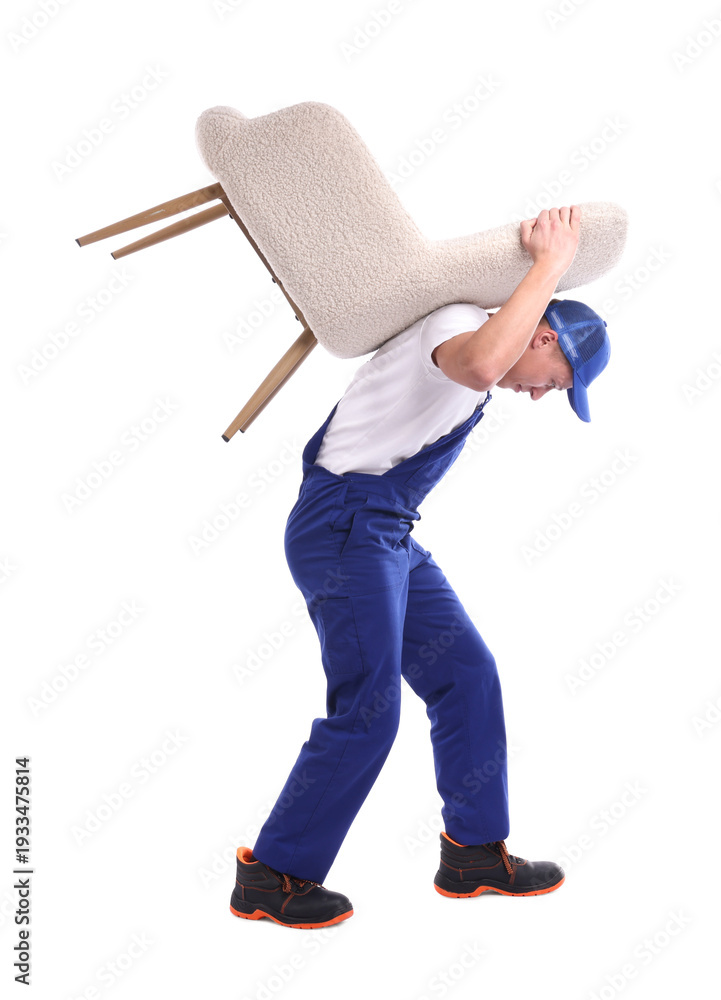 Naklejka premium Mover service worker carrying armchair on white background