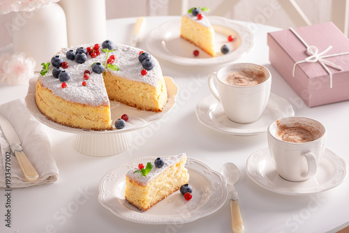 Delicious Basque cheesecake served on table for two.