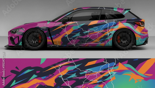 A car with a vibrant abstract graffiti wrap design featuring lightning bolts and colorful splatters.