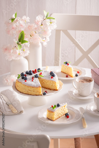 Tasty Basque cheesecake arranged on white porcelain and table.