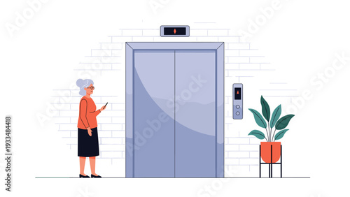 Senior woman stands in a building hallway waiting for an elevator while checking information on her mobile phone.