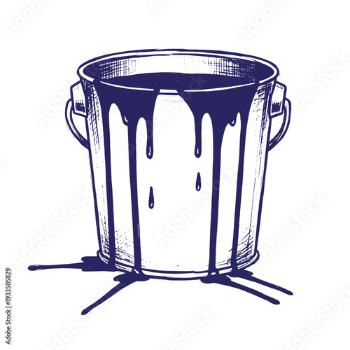 Vintage metal bucket with dark blue paint dripping down the sides and handles on a white background
