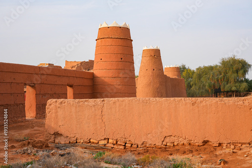 Bild auf Leinwand Traditional Najdi mud brick watchtower with white crenelations in Shaqra, a hist