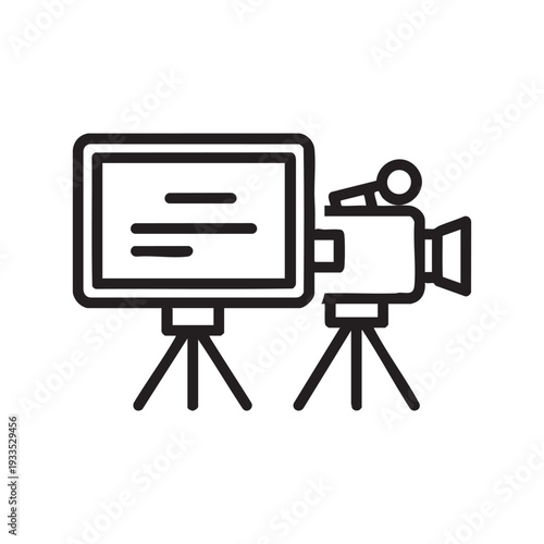 A camera and screen setup on tripods capturing the perfect shot in a studio setting from a straightforward viewpoint