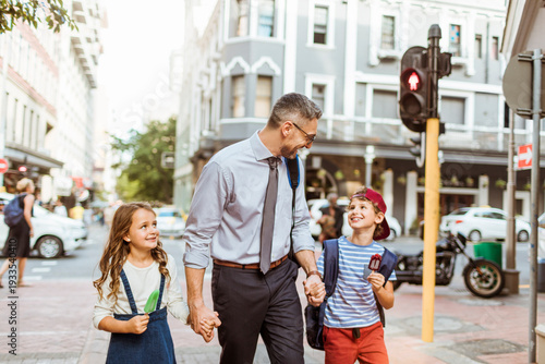 Photography Father walking with son and daughter at city crosswalk